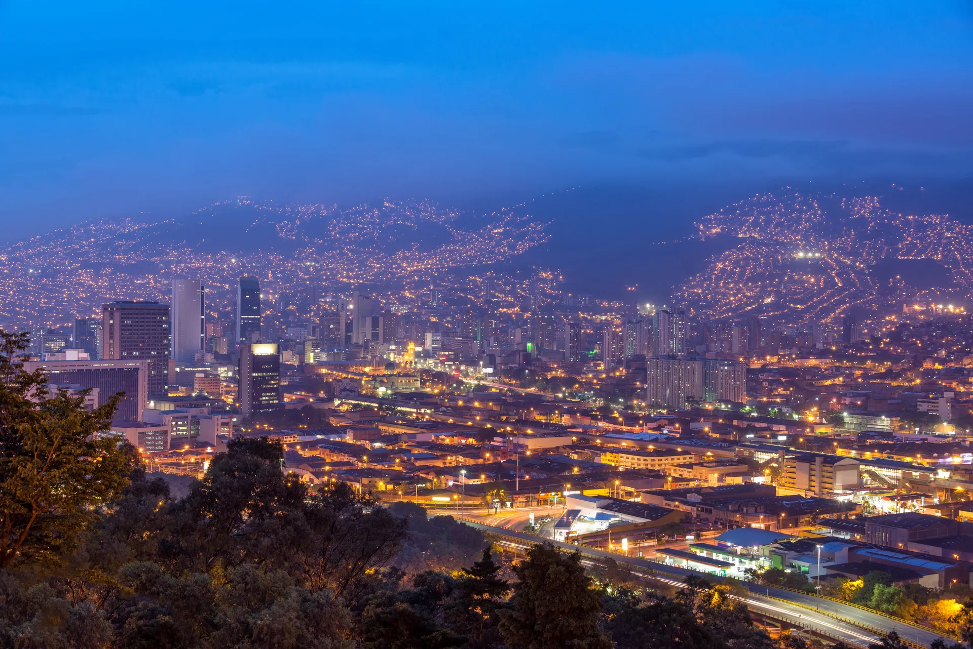 Medellín's cityscape spreading across the Aburrá Valley beneath the Andean peaks