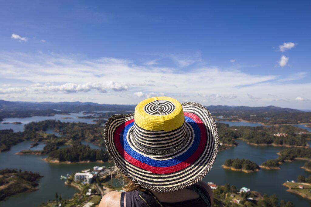A traveler looks out across the lake in Colombia
